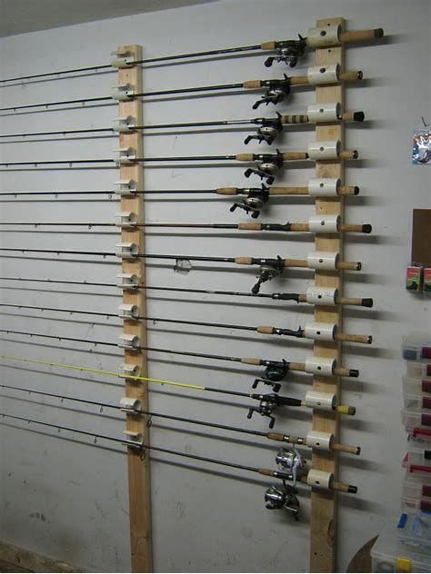 there are many fishing rods hanging on the wall