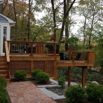 a wooden deck with steps leading up to it