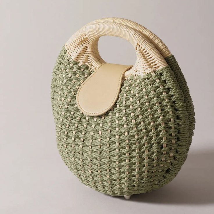 Handmade Bamboo Round Bag (Green) Designer Original Elevate Your Style With This Stunning Handmade Bamboo Round Bag, Designed For Those Who Appreciate Unique, Eco-Friendly Fashion. This One-Of-A-Kind Accessory Combines Natural Beauty With Functional Design, Making It The Perfect Statement Piece For Any Occasion. Features: Distinctive Round Design: A Modern Twist On Classic Shapes, This Bag Adds A Touch Of Sophistication To Any Outfit. Premium Bamboo Material: Crafted From High-Quality Bamboo, Th Chic Green Shoulder Bag With Braided Handles, Green Pouch Bucket Bag For Summer, Trendy Green Hobo Bag With Braided Handles, Chic Green Shoulder Bag With Round Handle, Chic Green Shoulder Bag For Vacation, Green Woven Handheld Straw Bag, Green Handheld Woven Straw Bag, Green Pouch Straw Bag For Vacation, Summer Straw Bag With Leather Handles For Errands