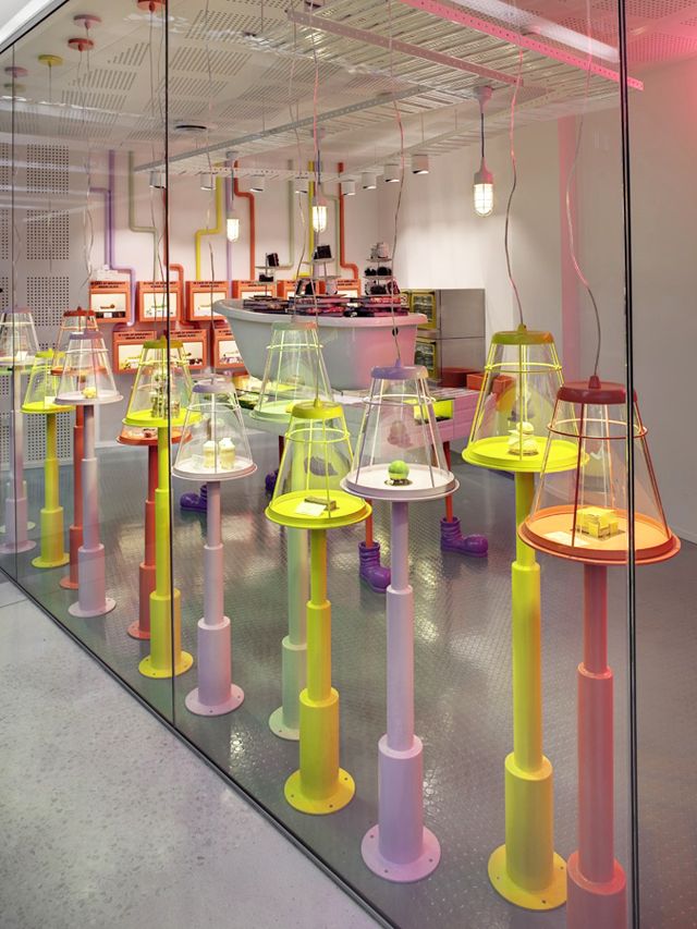 a room filled with lots of different colored lamps