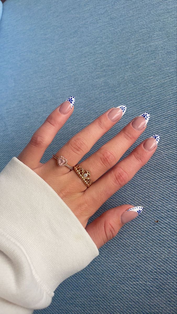 Blue Nail Patterns, White French With Blue Flowers, White Nail Blue Flower, Blue Dot French Nails, White French Nails With Blue Design, White Tips With Blue Design Nails, Nails White With Blue Design, Costal Floral Nails, Blue Design French Tip Nails