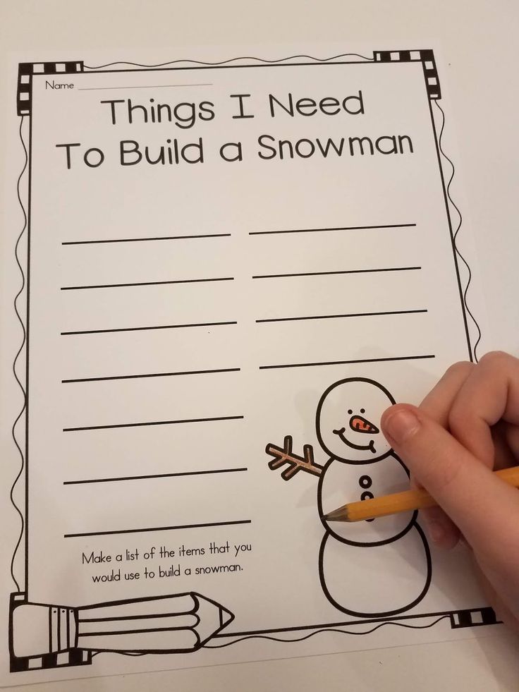 a hand holding a pencil and writing on a snowman activity sheet with the words things i need to build a snowman