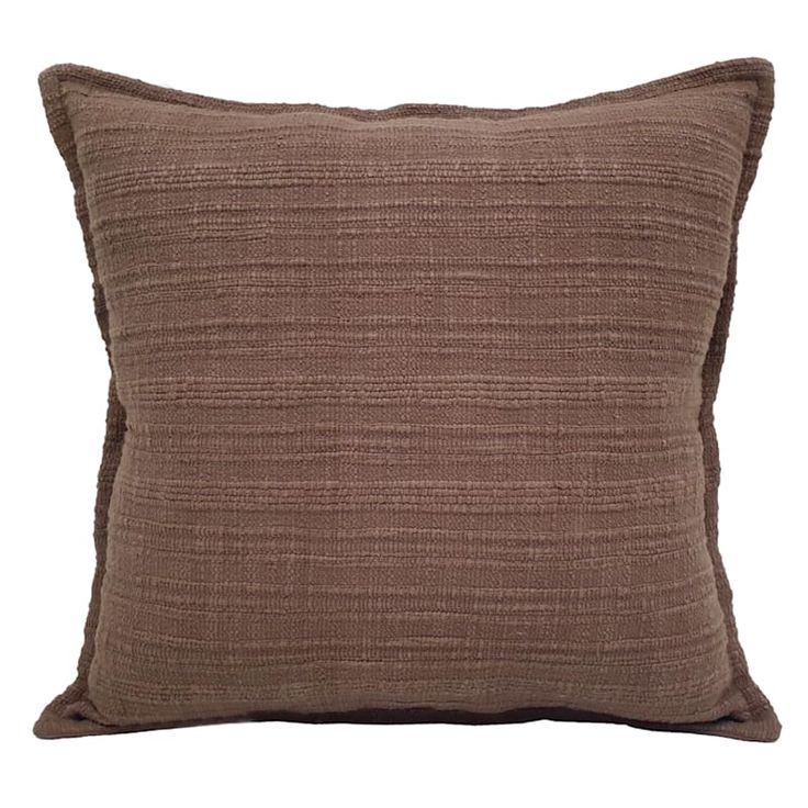 a brown pillow on a white background