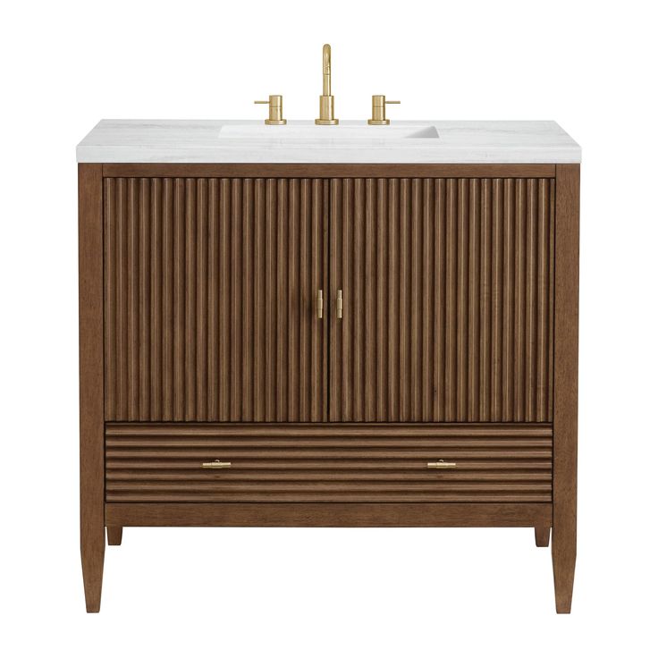 an image of a bathroom vanity with marble top and wooden cabinet doors on both sides