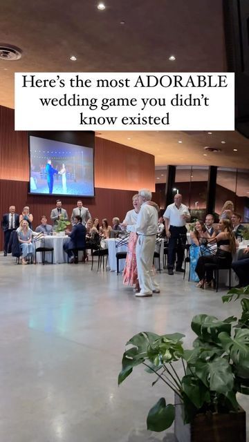 there is a man and woman dancing on the dance floor in front of an audience