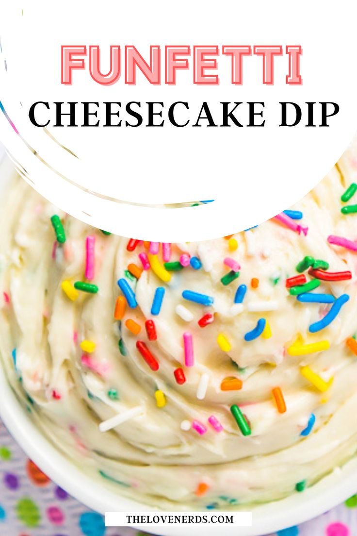 a white bowl filled with cake and sprinkles on top of a table