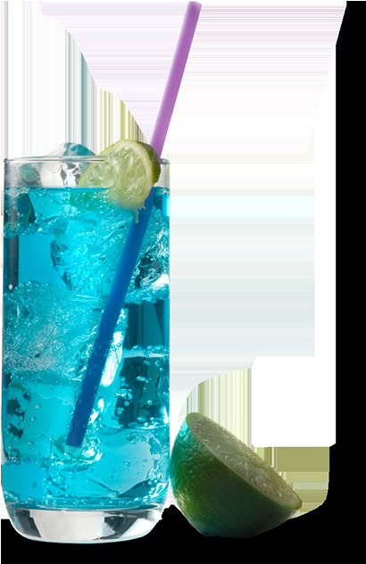 a blue drink with ice and lime on the rim next to a slice of lime