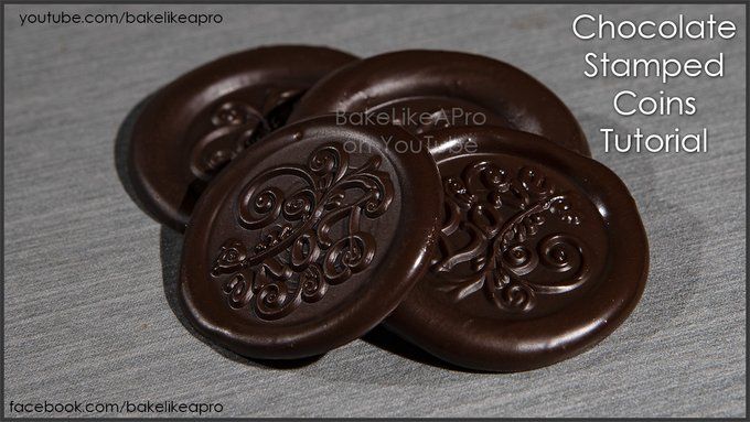 chocolate stamped coins are sitting on a table with the words chocolate stamped coins in front of them