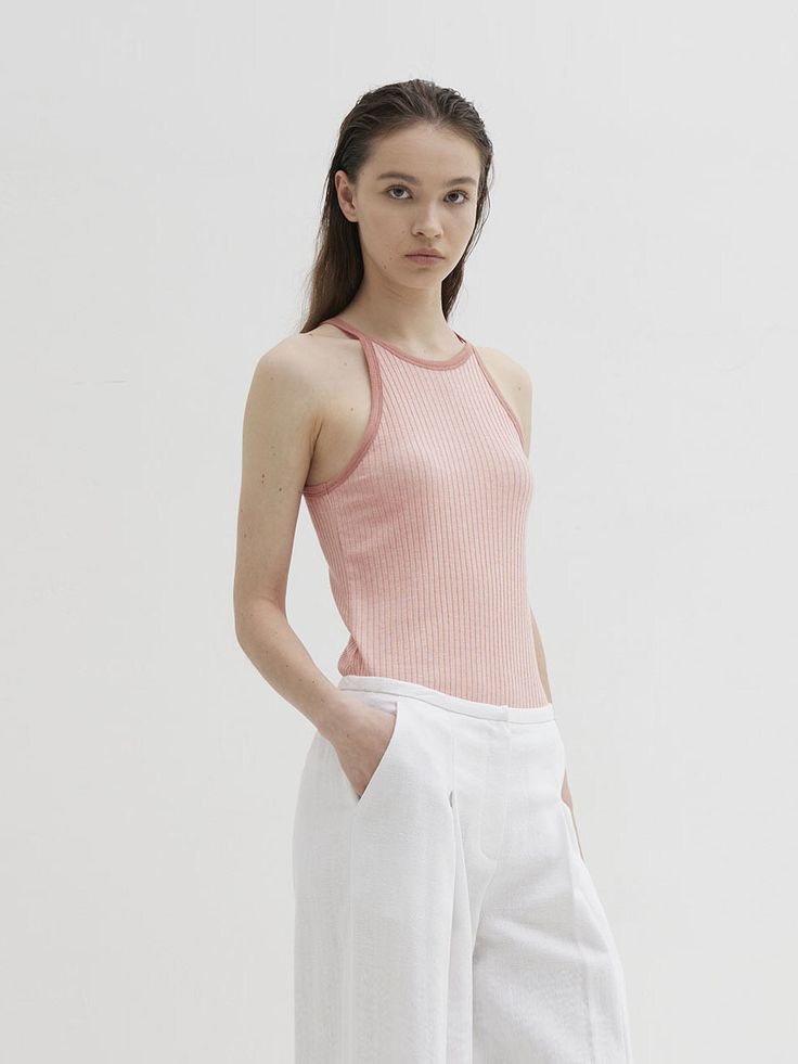 Editor's NotesThe Express Tank Top is a sleeveless ribbed top that you can wear daily with a soft touch.- Tencel blended material- Sleeveless- Slim silhouette- Ribbed structure Measurements(in.)Size: OneSize(XS-M)- Total Length:21.25in.- Neck: 7.87in.- Chest: 13.38in.- Hem: 13.38in. Model Info:(Katerina) Height 5' 74, Wearing a size One               Composition &Care- Fabric: 81% Tencel, 10% Span, 9% Wool- Dry CleanRecommended- Hand Wash at 30Degrees- Use LiquidNeutral Detergent Designer- by Theballon Spring Ribbed Tank Camisole, Spring Ribbed Cami Tank Top, Feminine Sleeveless Knit Top, Chic Pink Ribbed Knit Top, Summer Sleeveless Tank Top With Ribbed Neckline, Chic Summer Tank Top With Ribbed Neckline, Pink Ribbed Cami Top, Feminine Sleeveless Knit Top For Spring, Pink Ribbed Tank Top For Spring