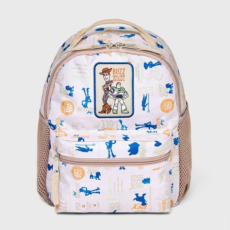 Get your kids ready for school with Toddler Toy Story Backpack in Beige. The main compartment features a zippered closure, providing a secure place to store books, folders and supplies. The adjustable shoulder straps ensure a comfortable fit, reducing strain and allowing for extended wear. It also comes with a front zip pocket and two water bottle holders making this backpack a great accessory that combines functionality and style. Water Bottle Holders, School Readiness, Elastic Hair Ties, All Toys, Laptop Pocket, Bottle Holders, Toy Story, Girls Accessories, Toddler Toys