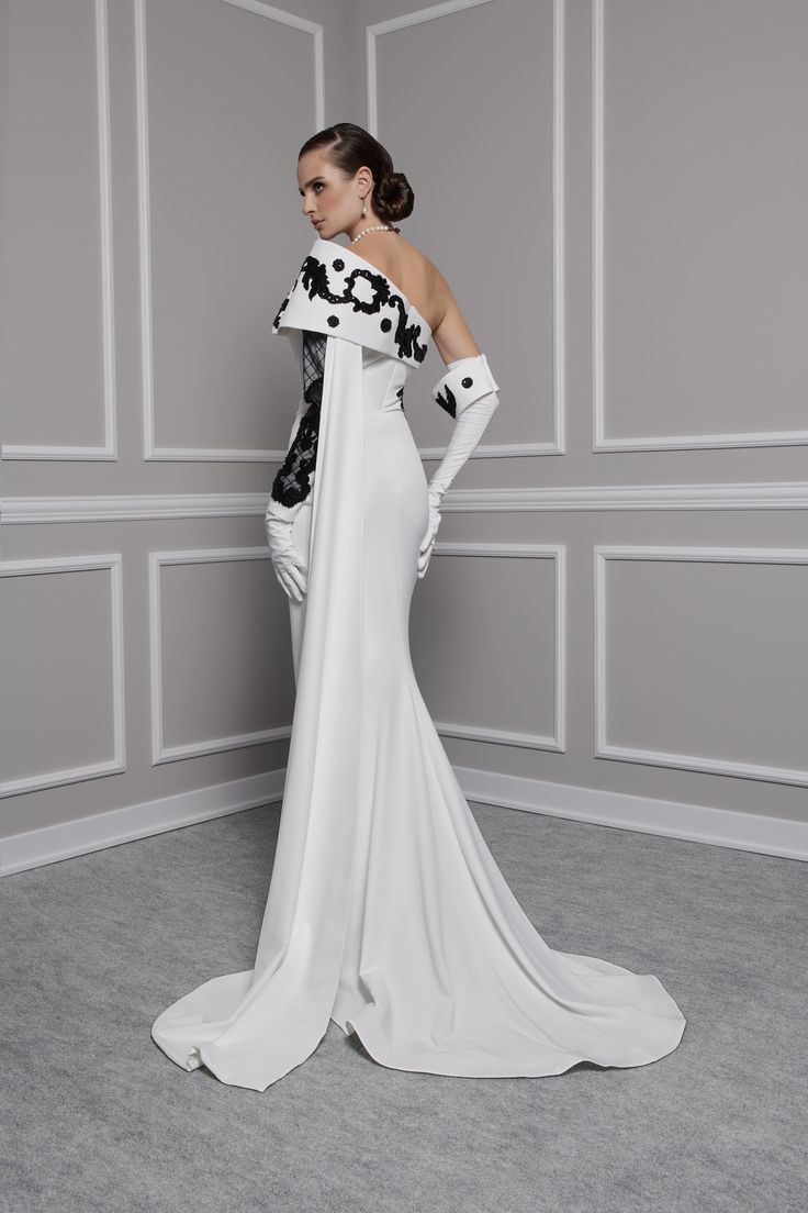 Step into elegance with MNM Couture F02803 from the Spring 2024 evening collection. This gown exudes sophistication and glamour, making it the perfect choice for your next special occasion. Elevate your style and make a statement with this stunning piece. Hydrating Essence, Mnm Couture, Classic Skirts, Dress Drape, Fashion D, Evening Dress Fashion, Crepe Dress, Spring 2024, Womens Fall