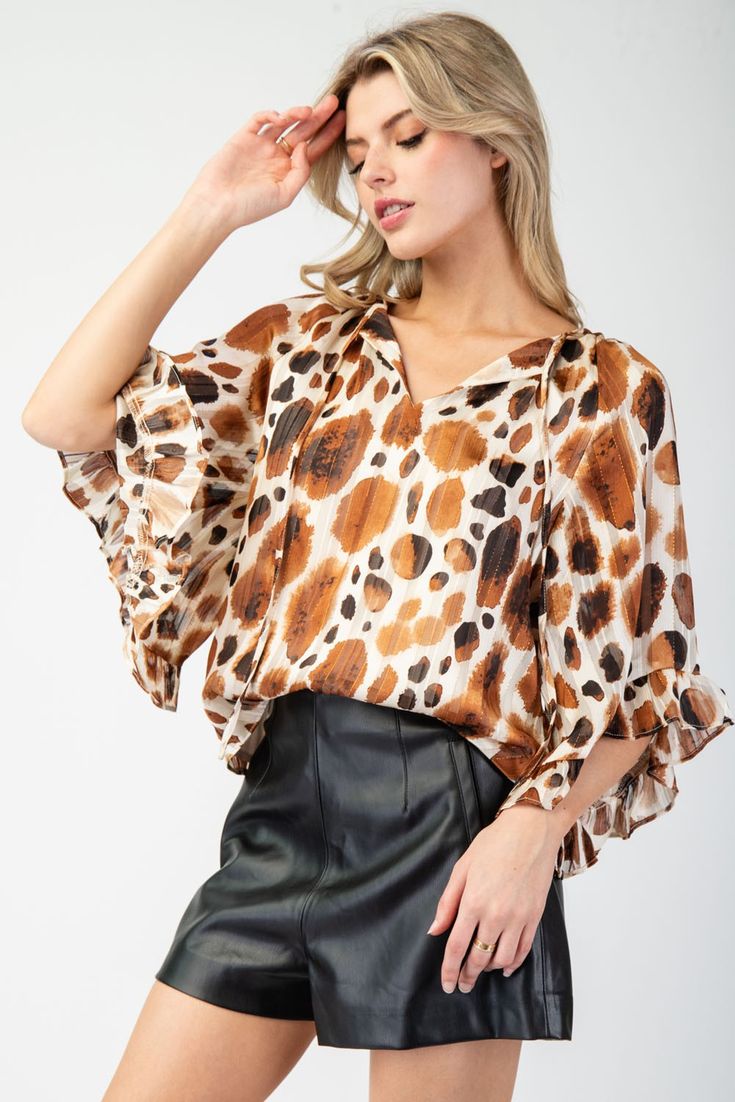 Brown Spotted 1/2 Sleeve Blouse | JQ Clothing Co. Brown Summer Office Top, Brown Summer Office Tops, Trendy Stretch Blouse For Office, Trendy Padded Stretch Blouse, Trendy Stretch Printed Blouse, Spring Brown Office Blouse, Chic Brown Printed Tops, Spring Office Blouse In Brown, Spring Office Brown Blouse