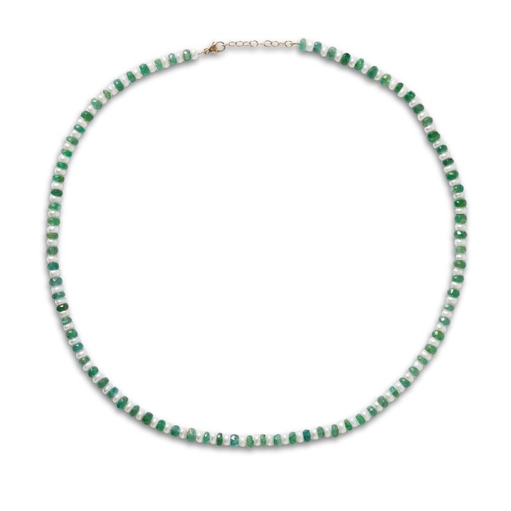 Hand strung beautiful pearl and emerald necklace finished in 14 karat gold. EmeraldFreshwater pearl 16 to 17 inchesHandmade in NYC About the stone Based on ancient mythology, Emerald was associated with Mercury, who was known to be the messengers of the gods, and of travel. Therefore, it is common that Emerald is referred to as the Travelers Protection Stone. All ancient cultures adored this mesmerizing green crystal that is considered as a symbol of beauty, spiritual power, eternal life, and wisdom. Emerald was favorite gemstone of Queen Cleopatra, a talisman of the Alexander the Great, Aristotle, and Charlemagne. Healing Properties Emerald, the stone of wisdom, love, and great harmony, supporting one to appreciate and enjoy life to its fullest. Emeralds are known to heal both emotional l Green Single Strand Pearl Necklace, Single Strand Green Pearl Necklace, Green Hand-strung Rondelle Necklaces, Green Faceted Necklace Fine Jewelry, Elegant Single Strand Green Onyx Necklace, Green Faceted Fine Jewelry Necklace, Emerald Single Strand Jewelry With Round Beads, Faceted Round Bead Necklaces For May Birthstone, Elegant Hand-strung Emerald Necklace As Gift