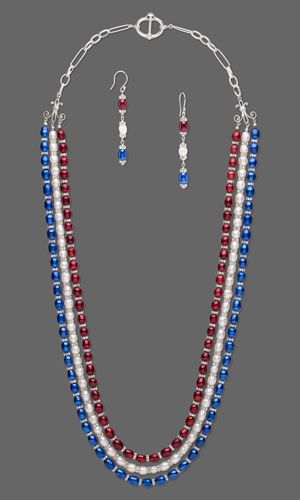 a red, white and blue beaded necklace and earring set with matching earrings