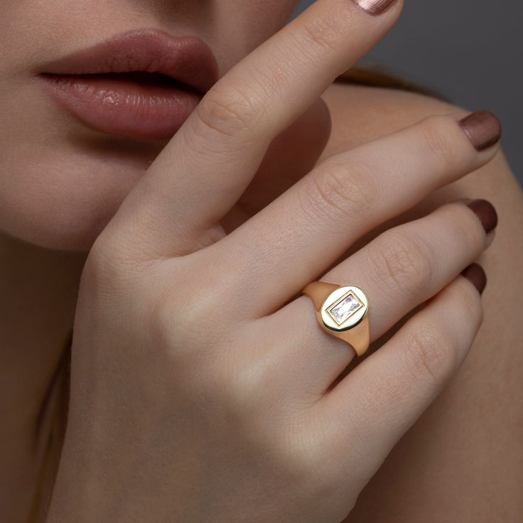 Introducing the Baguette Diamond Signet Ring - the perfect combination of style and elegance. Perfect for everyday wear or special occasions, this enduring signet is made with 925 Sterling Silver and available in silver, gold and rose gold colors. If you're looking for jewelry that is chic yet fashion-forward for a timeless look, this ring will make the perfect statement. It features an elegant baguette diamond and a cut-out design that adds a subtle hint of sophistication - the perfect accessor Plating Techniques, Diamond Signet Ring, Gold Colors, Experience Gifts, Pretty Gift, Baguette Diamond, Rose Gold Color, Jewelry For Women, Ring Handmade