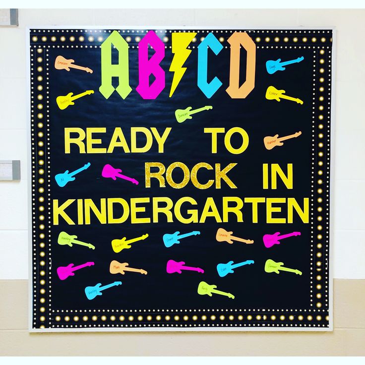 a sign that says, ready to rock in kindergartaten on the wall