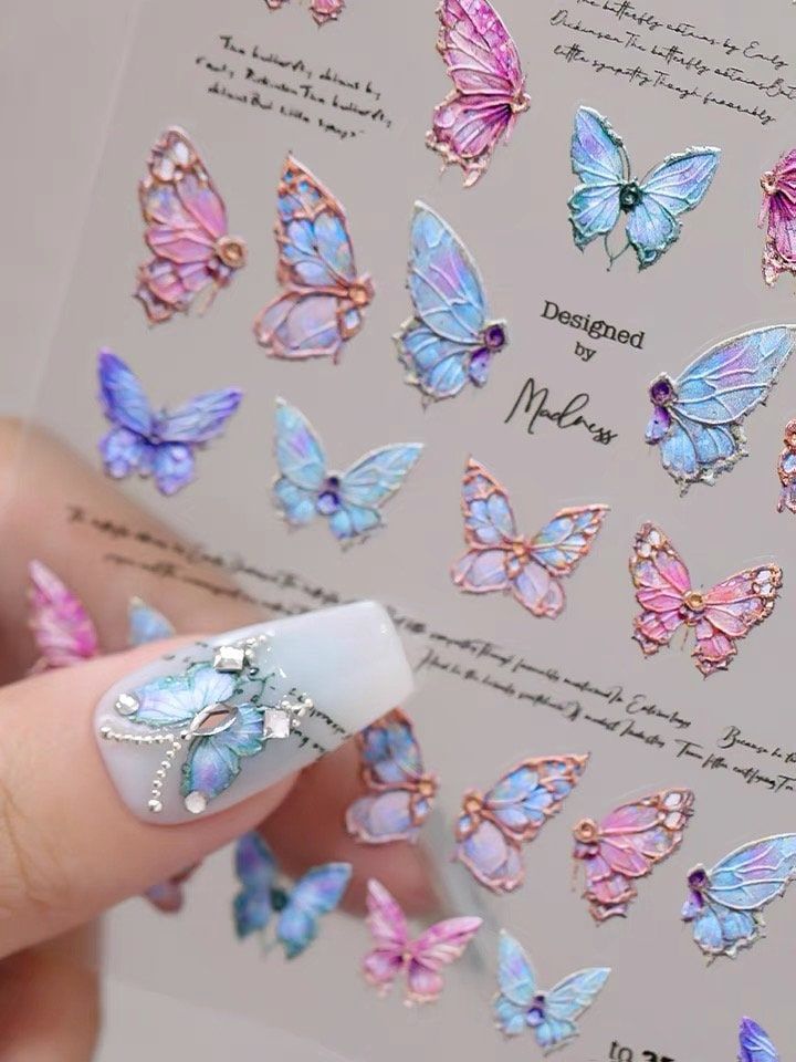 "♥ 1 sheet of embossed butterfly nail sticker ♥ A 10-Second Way to Make At-Home Nail Art Look Pro How to use: 1. Apply a base coat and nail polish.  2. Place the stickers on your nails 3. Smoothen the stickers to avoid bubbles 4. Apply a transparent coating * IMPORTANT  Our processing time is 1-2 business days. The standard shipping is untracked and posted in envelope via the Hong Kong Post. We believe it is the most cost-efficient option among all. Etsy defaults \"pre-transit\" status for all the orders because we are not in the US. Please rest assured that we always ship on time (exceptional occasions will be informed). There are regions still be affected by the limited flights. Feel free to drop us a message if you have any questions! Follow us for latest updates and discounts! instagra Nail Art With Stickers, Butterfly Sticker Nails, Nail Art Butterfly Design, 3d Butterfly Nails, Nails With Stickers, Butterfly Nails Design, Butterfly Nail Art Designs, Crown Nail Art, Nail Art Butterfly