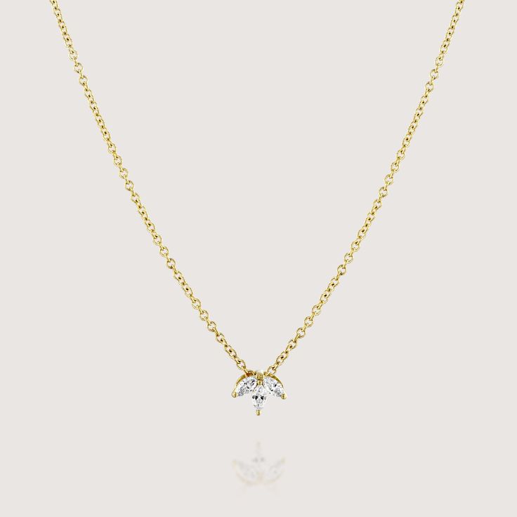 The essence of elegance, the white marquise shaped diamonds catch the light effortlessly in a gold symmetrical petal array. Turn the pendant to its back side for a delightful surprise. As part of the LA MARQUIS collection was inspired by Parisian springtime, the series was designed with floral and natural elements adorned by the glisten of diamonds and gold. Guaranteed to catch the eye, this hypnotizing piece is fit for any occasion and adds the perfect amount of glamour to any look. All features can be customized! Please contact us if you wish to make changes, we love making custom designs. All of our jewelry is carefully handmade in our atelier. *HC diamond are all conflict-free diamonds To order by phone 972-72-2991000 Luxury Marquise Necklace With Single Diamond, Luxury Single Diamond Marquise Necklaces, Luxury Marquise Single Diamond Necklace, Gold Marquise Solitaire Necklace, Luxury Marquise Diamond Necklace Gift, Yellow Gold Marquise Necklace With Single Diamond, Luxury Gold Marquise Cut Necklace, Luxury Marquise Necklace For Gift, Elegant Marquise Diamond Necklace With Single Diamond