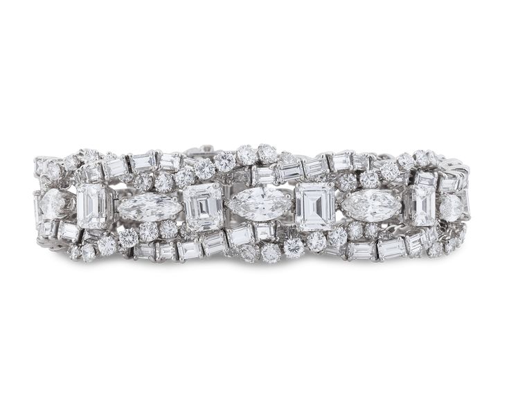 Alternating strands of diamonds totaling approximately 55.04 carats dazzle in this exceptionally rare vintage French bracelet. For centuries, the diamond was thought to possess magical properties. Even today, there is a magic to diamonds such as these, as stones of this quality are extremely scarce. The largest five diamonds weigh 9.19 total carats and are certified by the Gemological Institute of America (GIA) as possessing perfect D color. Two of these stones are also graded as Internally Flaw Cocktail Bracelet, Colored Diamond Jewelry, Estate Diamond Jewelry, Extraordinary Jewelry, Emerald Cut Diamond Ring, Bracelet Tennis, Cocktail Jewelry, Mid Century Jewelry, Expensive Jewelry