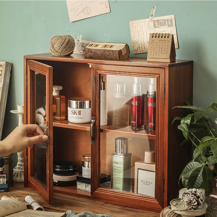 a wooden cabinet filled with personal care items