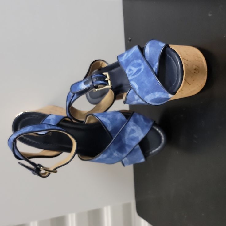 Never Worn Michael Kors Open Toe Sandals With 4-inch Heel, Chic Blue Wedge Sandals With Round Toe, Chic Blue Round Toe Wedge Sandals, Blue Synthetic Wedge Sandals With Heel Strap, Blue Synthetic Wedge Sandals With Block Heel, Blue Synthetic Wedge Sandals With Ankle Strap, Blue Synthetic Ankle Strap Wedge Sandals, Blue Cushioned Ankle Strap Wedge Sandals, Blue Wedge Heels With Removable Insole