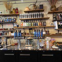 the coffee bar is stocked with many items