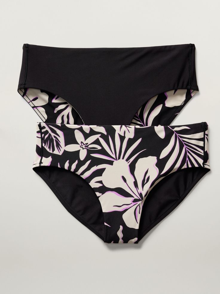 Athleta Girl Reversible Mid Rise Swim Bottom | Athleta Black Graphic Print Swimwear For Swimming, Black Tropical Swimwear For Surfing, Tropical Black Swimwear For Surfing, Black Graphic Print Swimwear, Stretch Tropical Tankini For Surfing, Tropical Stretch Tankini For Surfing, Graphic Print Swimwear For Surfing, Black Graphic Print Swimwear For Beach, Graphic Print Swimwear For Surfing In Beach Season