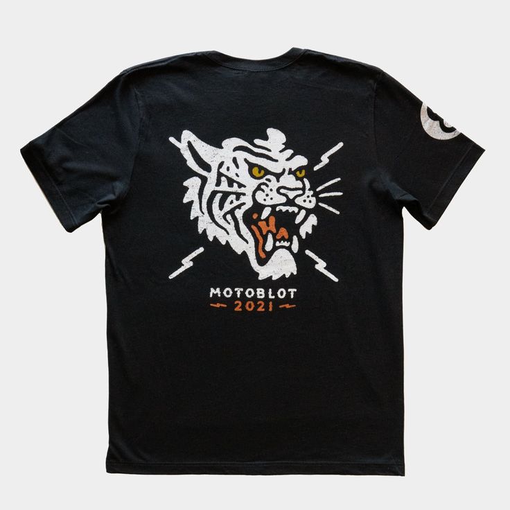 Motoblot 2021 Tiger #8 Tiger T-Shirt. 100% Cotton. Casual Screen Print T-shirt For Biker Events, Black Graphic T-shirt For Motorcycling, Black Graphic Print T-shirt For Motorcycling, Motorcycling Short Sleeve Screen Print T-shirt, Moto Style Graphic Print Crew Neck T-shirt, Casual Motorcycling T-shirt With Screen Print, Motorcycling Graphic Print Crew Neck T-shirt, Black Graphic Tee For Motorcycling, Black Moto T-shirt With Graphic Print