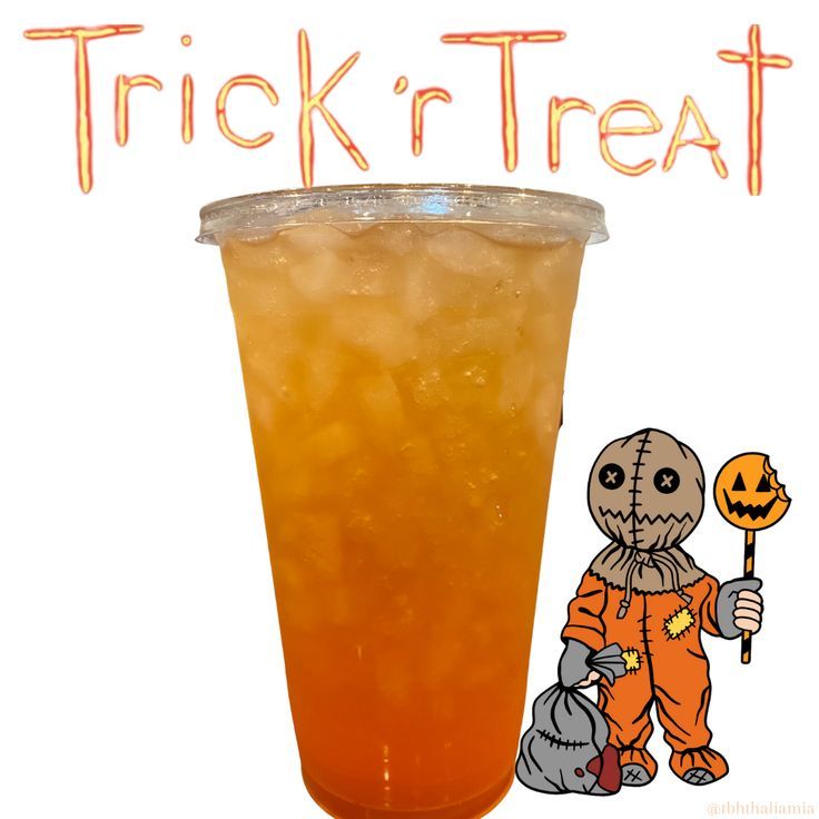 a tall glass filled with liquid and a skeleton holding a trick'r treat