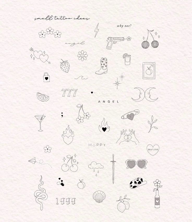 the back side of a white paper with black ink drawings on it and various symbols