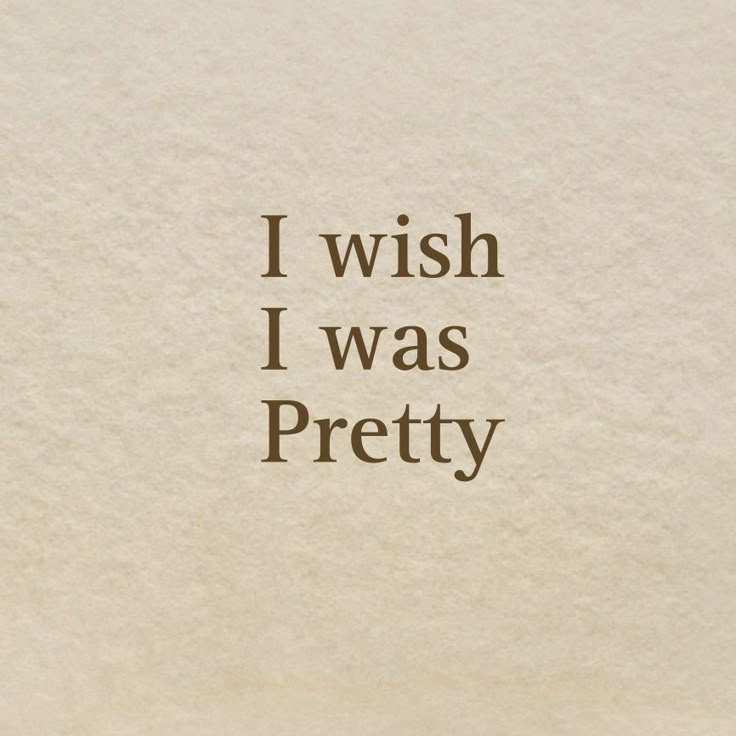 the words i wish i was pretty written in brown ink