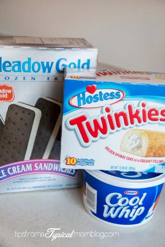 two boxes of hostess twinkies and an ice cream sandwich