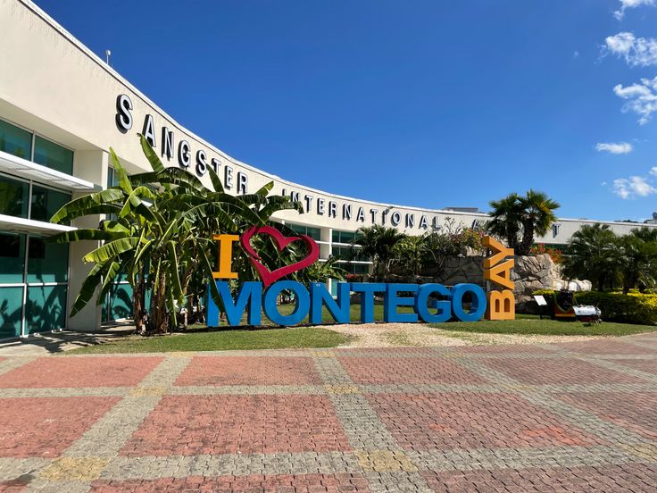 the entrance to montego is decorated with colorful letters