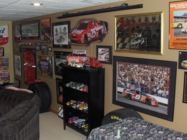 a room filled with racing memorabilia and pictures