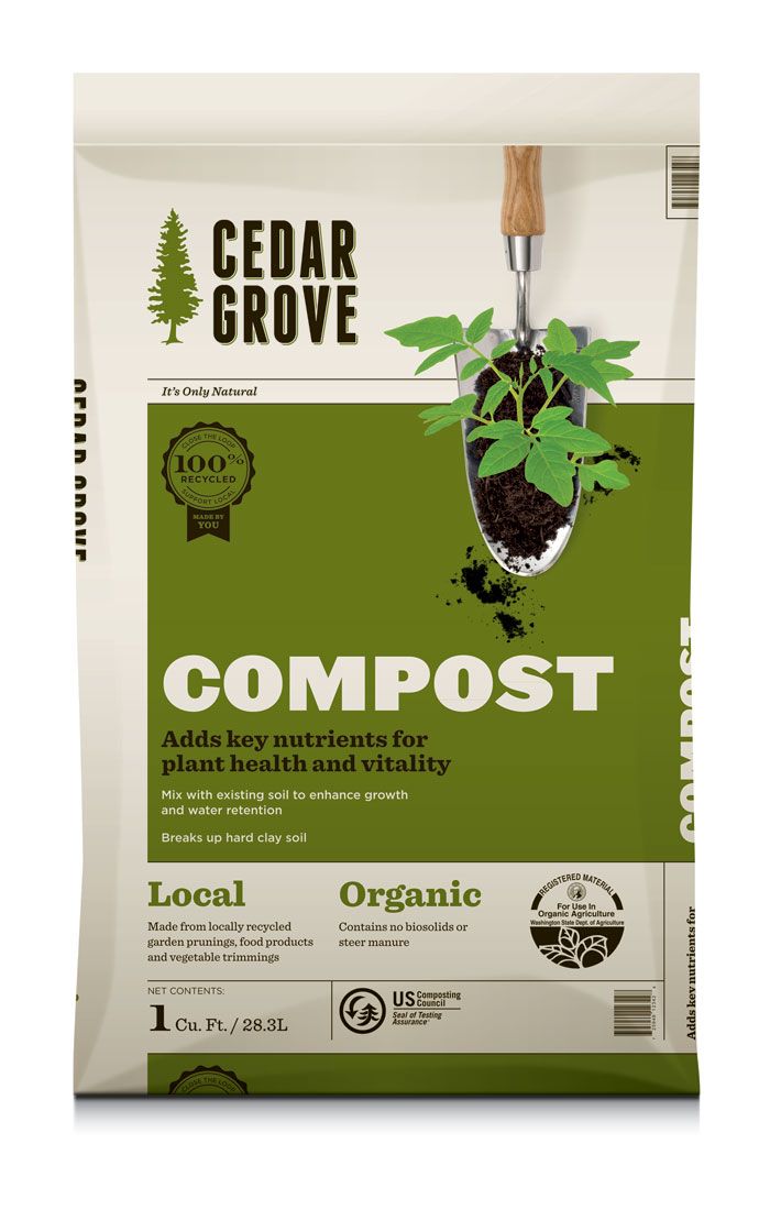 a bag of compost is shown with a plant in it