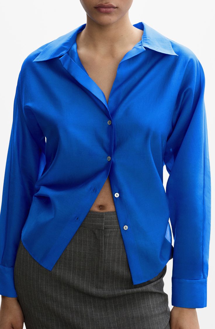 Add a lilt of luster to your look with an endlessly wearable button-up cut from soft satin. Front button closure Spread collar Long sleeves 84% lyocell, 16% polyester Machine wash, line dry Imported Silk Button-up Shirt For Office, Classic Blue Silk Blouse, Silk Button-up Office Top, Sleek Silk Button-up Top, Silk Shirt With Button Closure, Sleek Spring Workwear Shirt, Sleek Spring Blouse With Button Closure, Sleek Collared Spring Blouse, Sleek Collared Blouse For Spring