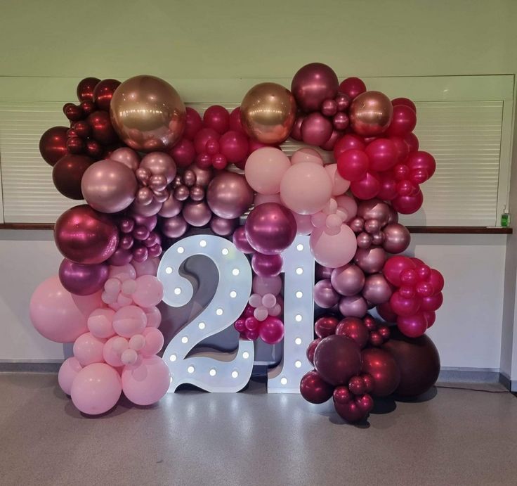 the number twenty two is surrounded by balloons