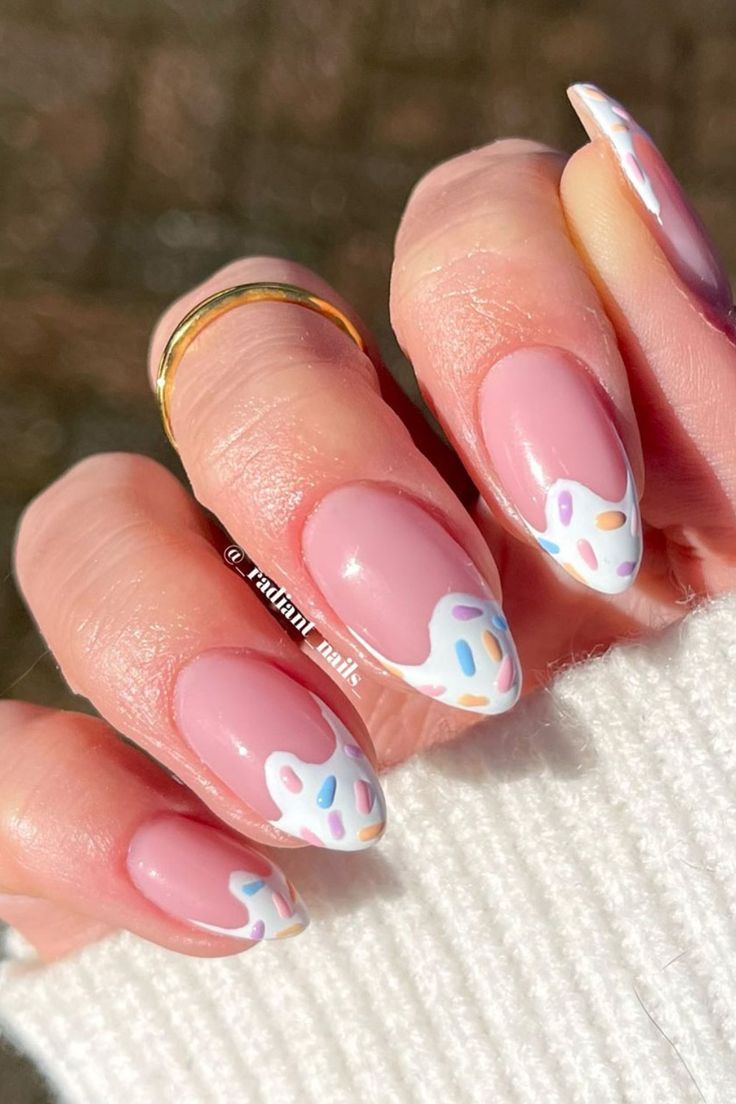 Get ready to indulge in sweetness with this cute nail design by @_radiant_nails_ featuring white wavy tips adorned with colorful sprinkles, reminiscent of delightful ice cream toppings for a charming and playful touch. Looking for fresh nail art inspiration? Look no further! Visit nailustrous.com to delve into our article packed with innovative ideas and step up your nail game like never before! Nail Designs For The Summer, Nails Sprinkles, Easy Nail Art Coffin Shape, Fun And Simple Nails, Nail Designs For Short Almond Nails, Nail Art Ice Cream, Cute Nail Ideas Summer, Nail Ideas For Moms, Cute Nail Designs Gel