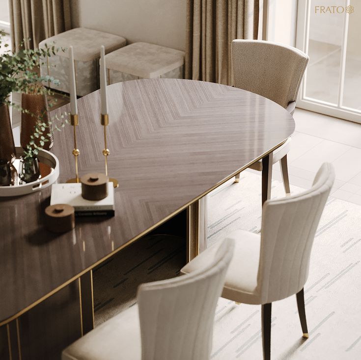 a dining room table with white chairs and a vase filled with flowers next to it