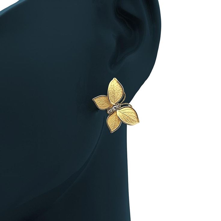 Experience Italian craftsmanship at its finest with our exquisite Diamond dangle drop earrings. The centerpiece of these earrings is a delicate butterfly with elegantly crafted leaves as its wings, creating a captivating and nature-inspired design. Available in both 14k and 18k gold, these earrings bring a touch of luxury and nature's beauty to your style. Elevate your look with the perfect blend of Italian artistry and organic elegance, shop now to adorn yourself with this unique masterpiece. 1 Delicate Butterfly, Italian Craftsmanship, Italian Jewelry, Nature Inspired Design, Butterfly Shape, Gold Butterfly, Gold Rose, Nature Inspired, Natural Diamonds