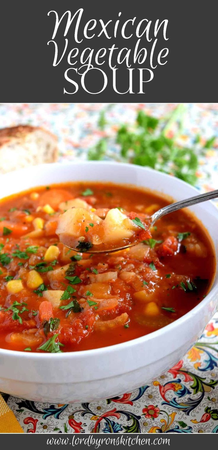 mexican vegetable soup in a white bowl with a spoon on the side and text overlay