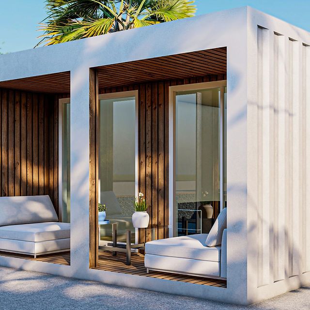 an outdoor living area with white furniture and palm trees