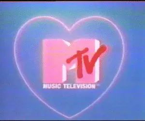 the tv logo is displayed in front of a heart