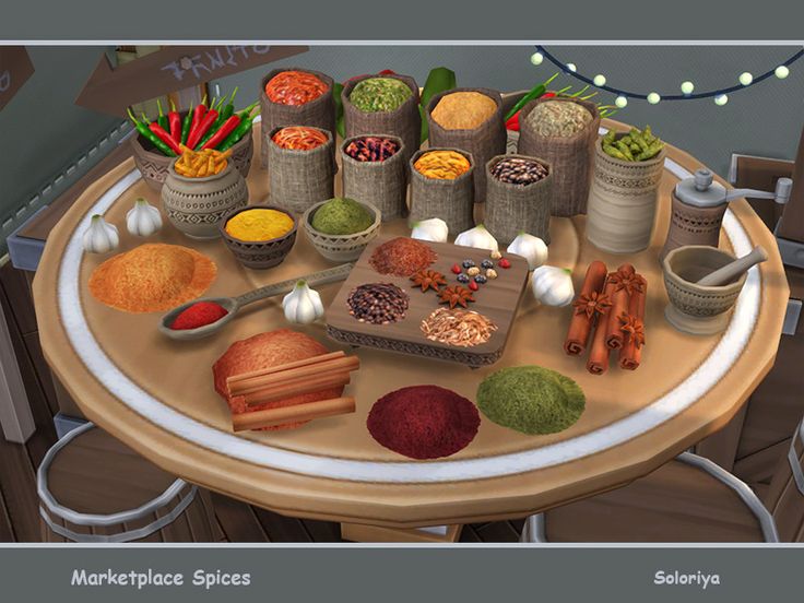 a table topped with lots of different types of spices and condiments on top of it