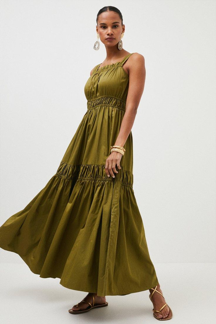 Exude High-Summer Confidence And Relaxed Dressing With This Confident Cotton Floor-Skimming Maxi Dress. Elegantly Shirred Creating A Feminine Ruched Effect, It Boasts Contemporary Chunky Straps On The Shoulder. Simplistically Striking, Elevate The Design With Bold Gold Jewellery And A Show Stopping Pair Of Sandals. Bold Gold Jewelry, Dress Elegantly, Latest Maxi Dresses, Maxi Dress Collection, Khaki Dress, Karen Millen, Khaki Green, Fashion Face, Gold Jewellery