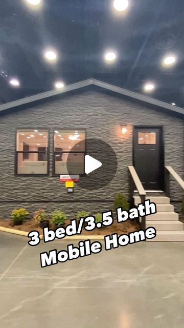 a mobile home with the words 3 bed / 3 5 bath mobile home