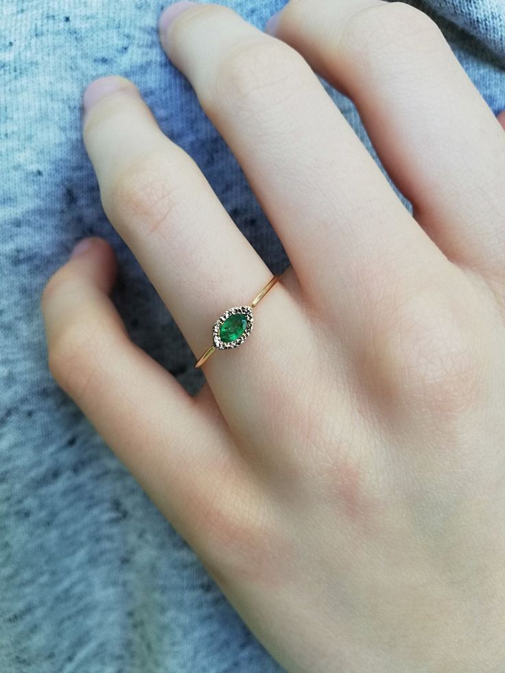 Gorgeous tsavorite garnet ring handcrafted in 14k rose gold. Truly unique and beautiful dainty ring with natural gemstone. Back of the ring features tiny heart cut out. Such a love ring is perfect for engagement, or Christmas gift for wife, girlfriend, sister. CENTRAL STONE: *tsavorite garnet, natural Earth mined gemstone with beautiful green color APPROXIMATE MEASUREMENTS OF THE RING: *head of the ring: 8mm x 4.5mm *band: approximately 1mm wide *size: please choose from the dropdown menu. If yo Elegant Green Opal Ring In 14k Gold, 14k Gold Emerald Ring For Promise, May Birthstone, 14k Gold Emerald Promise Ring, May Birthstone, Fine Jewelry Rose Gold Emerald Ring For Gift, Green 14k Gold Promise Birthstone Ring, Rose Gold Emerald Ring For Gift, Fine Jewelry, 14k Gold Emerald Ring As May Birthstone Gift, 14k Gold Emerald Ring With Bezel Setting As Gift, 14k Gold Emerald Ring Gift For May Birthstone