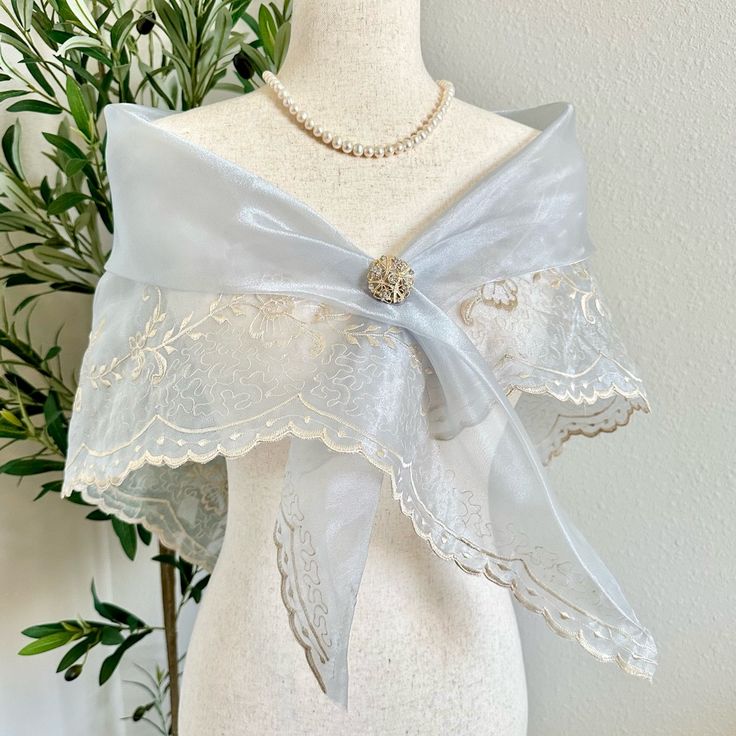 This Elegant Embroidered Organza Alampay Panuelo Is An Elegant Shawl And Cover To Dress Up Your Outfit Or Your Filipina Maria Clara Style. This Beautiful Cover Wraps Around Your Shoulders And Is Perfect To Put Over A Simple Black Dress Or Any Colored Dress. Perfect For Weddings, Silver Anniversary, And Special Occasions. Wear It As A Philippine Costume And Filipiniana Style. Comes With A Pin As Shown In The Pictures. One Size Fits All. Wraps For Dresses Shawls And, 19th Century Mexican Fashion, Off The Shoulder Shawl, Silver Clothes Aesthetic, Elven Wedding Suit, Unique Fashion Accessories, Elegant Embroidered Wedding Shawl, Panuelo Filipiniana, Black Dress Silver Accessories