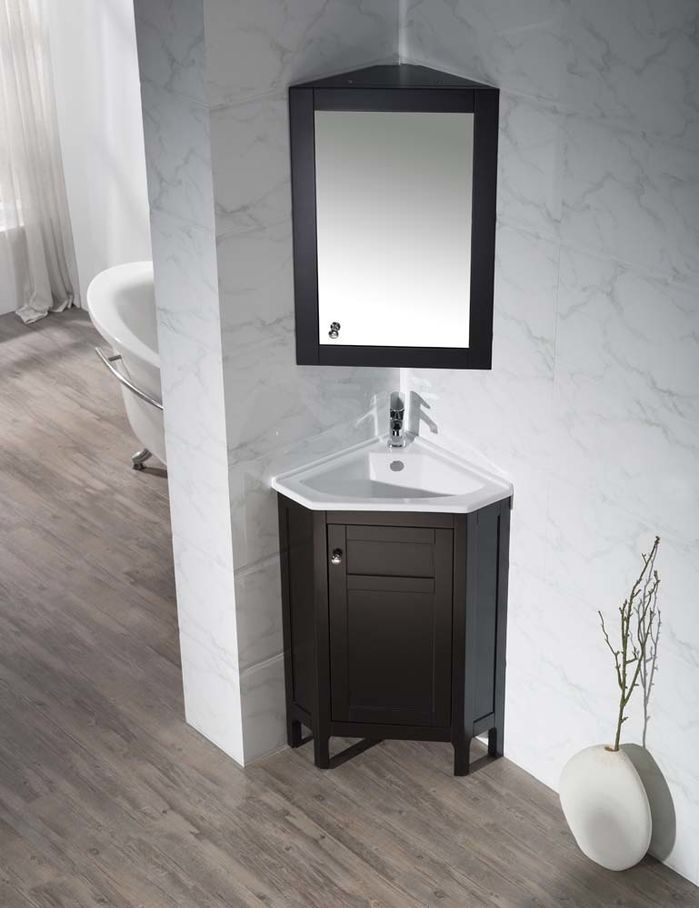 a white sink sitting under a bathroom mirror next to a bath tub and wooden floor