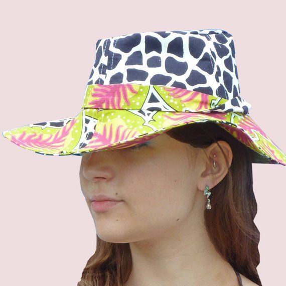 This is a sewing pattern for the hat in photos you are receiving:*a digital tracing of all the pattern pieces in actual size with grain line direction and match notches included*a detailed list of materials you'll need to make the item*step by step instructions for cutting, sewing and finishing the hatplease note that pdf files are set up for the size 'medium': 23" (58 cm) head circumference.*if you prefer to receive the pattern in paper form, please contact me for the cost of postage. Floppy Sun Hat, Red Tissue Paper, Floppy Sun Hats, Knit Alpaca, Metal Stars, Funky Fashion, Paper Pattern, Blue Wool, Custom Hats